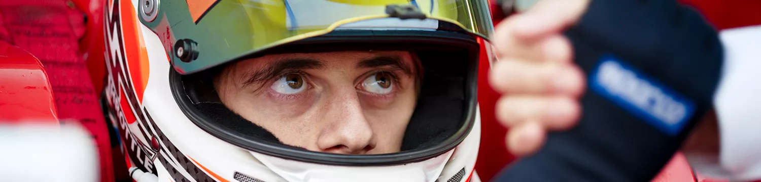 "Formula One" refers to a type of international auto racing that involves high-performance, single-seat race cars. As an AI language model, I am not able to provide an image or visual representation of the sport, but here are some possible alt text descriptions: